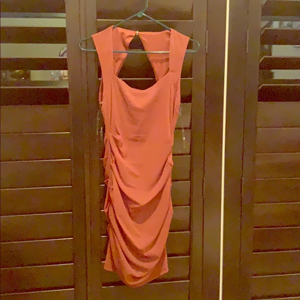 Burnt orange ruched dress.